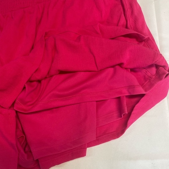 Torrid got pink elastic waist shorts, size 4. These are multi layer and lined. - Picture 2 of 4